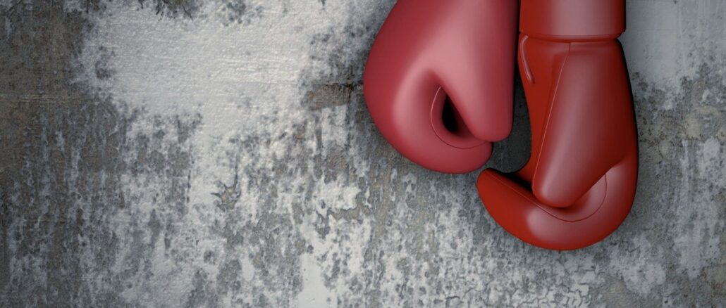 Elinga Gustafsson ripustaa nyrkkeilyhanskansa naulaan. Kuvituskuva. Kuva: Pixabay.