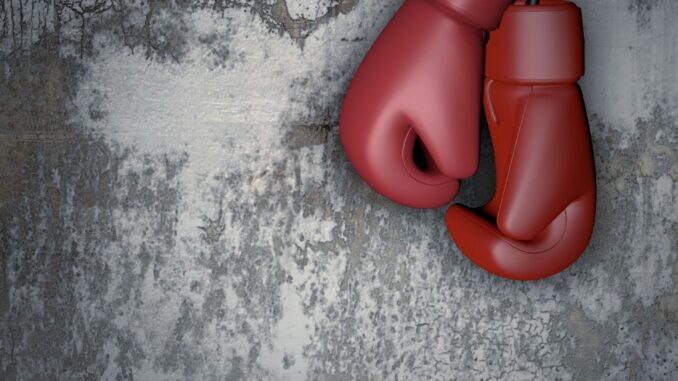Elinga Gustafsson ripustaa nyrkkeilyhanskansa naulaan. Kuvituskuva. Kuva: Pixabay.